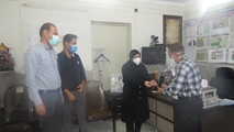 تجلیل از کارمند نمونه شبکه بهداشت و درمان